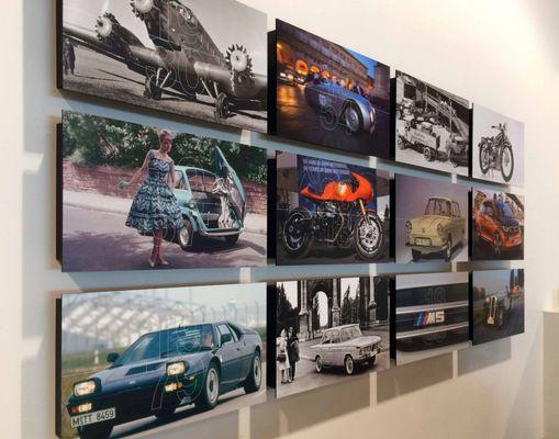 Raised photographic panels showcasing the evolution and history of BMW at the American Car Museum exhibit