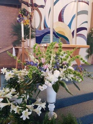 EASTER JOY in the blooms of God's creations at the Newman Center by 
 Janet Killian AIFD