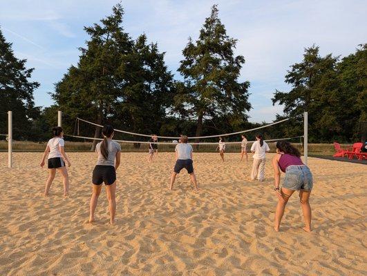 Campers playing beach volleyball at our Lawrenceville School Camp