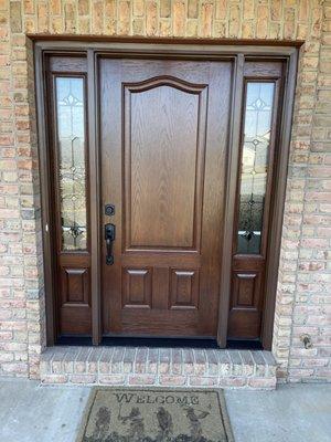 Brand new ProVia Signet Series wood grain stained fiberglass entry door