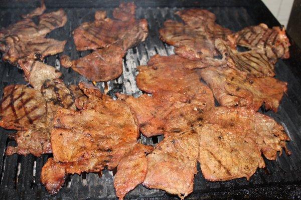 True Carne Asada grilled on a charcoal grill for that great taste that can't be beat