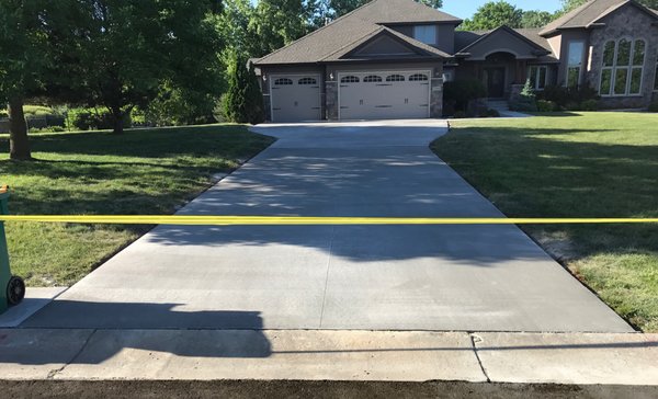 Broom finished concrete driveway.