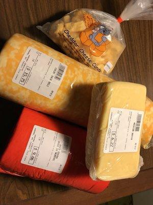 Edible souvenirs from this trip.  Curds are already gone, just started on the Brick Cheese.  CoJack and aged Gouda are longer term projects.