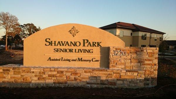 stucco monument sign with address letters