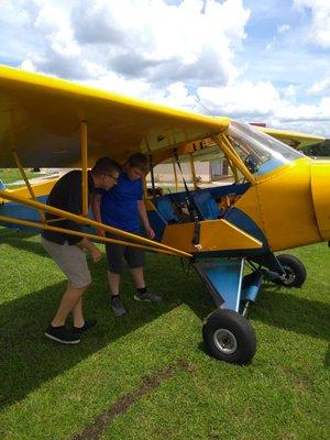 Getting shown some of the basics of a pre flight check.