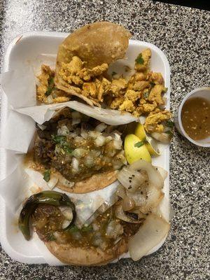 I forgot to take the pic before I almost devoured the Taco de Pollo. Middle is lengua, and a birria taco.