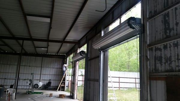 Commercial roll up doors installed. Warehouse. Maintenance and repair.