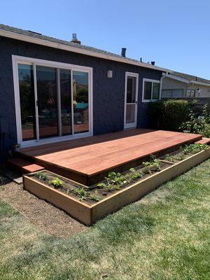 We specialize in carpentry work as well. Here we built a small deck for our client