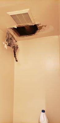 This is my neighbors master bath. My toliet and shower were leaking which caused her ceiling to fall. Going on 3 months