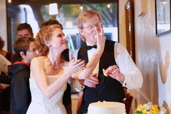 Just married and sharing cake!