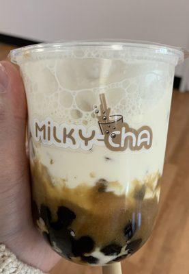 Taro tea. Too thick with the caramel looking stuff. Boba was good tho