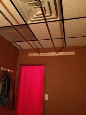 A room with a pole, for hanging your laundry?