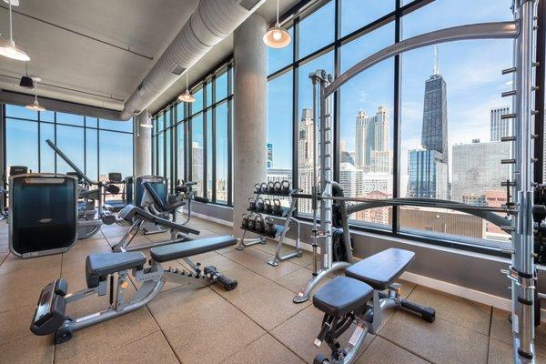 2,600 square foot health club with Expansive health club with Matrix cardio and strength training equipment with individual TV screens