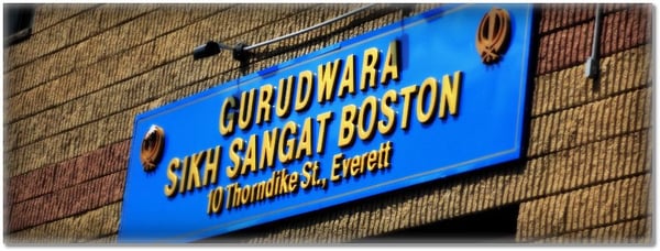 Gurudwara Board Above Indoor Parking