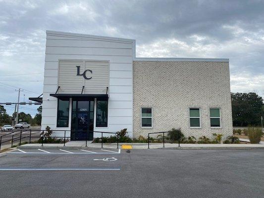 Exterior picture of the office on Hutchison at the interrsection of Clara Ave.