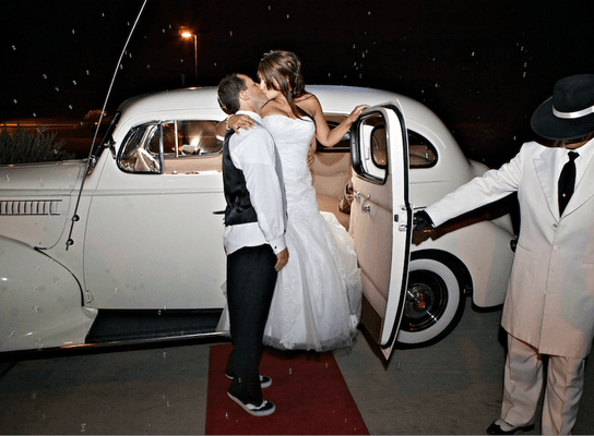 More happy Brides and Grooms in Lake Forest Limos 1939 American Rolls Royce Packard