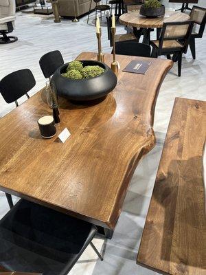 Casual dinning table with bench on one side.