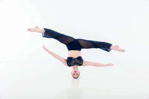 Mint Hill Dance Center dancer in a headstand