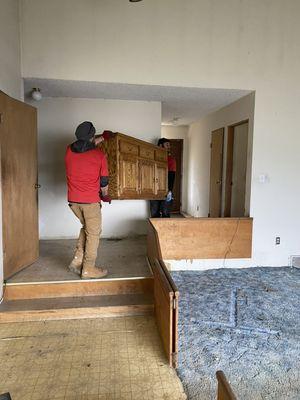 Furniture Removal in Action: Our team efficiently handles furniture removal, making sure your space is cleared with care and precision.