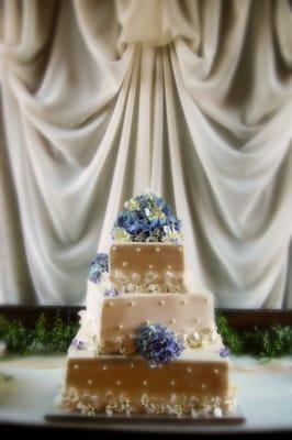 Wedding Cake by Vellentini Bakery - Flowers by Suzy Haggerty. Part of the Dream Team from the OWN Network Wedding.