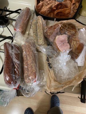 Assortment of turkey Sausage products & smoke Split turkey thighs.   YMMY