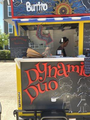 That's Chef/Owner Stephanie inside the tiny food "cart".