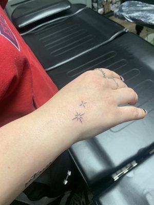 Star hand tattoo