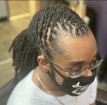 Loc  retwist & style.