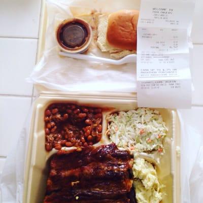 Rib plate to go. Comes with potato salad, Cole slaw, baked beans and a roll. For $6.57 including tax, very good!