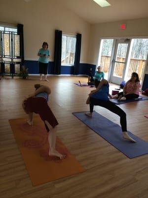 Our Studio in Chantilly has light filled space and plenty of room.  Working on Bird of Paradise pose.