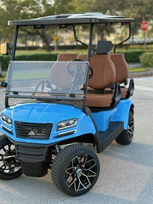 A blue Sierra LSV golf cart for sale in Miami.