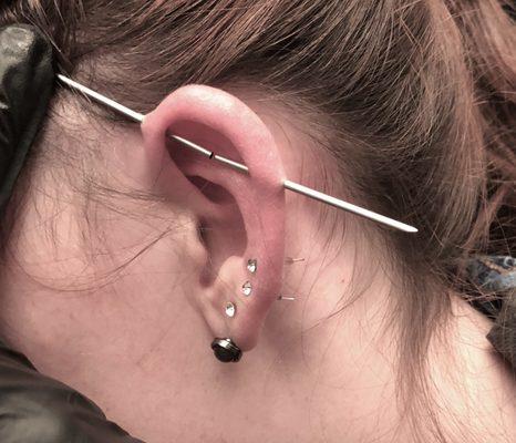 Picture shows the industrial piercing process and the correct angles of the two needles used