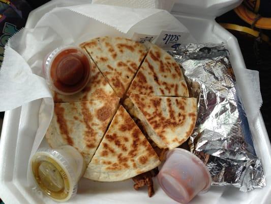 Alpastor quesadilla and an egg & chorizo taco.