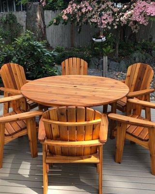 Six foot garden table with six garden chairs.