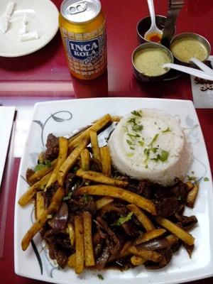 Lomo saltado with inca kola