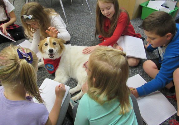 Check out our service dog, Triss. She loves school.