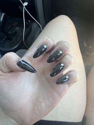 Horrible nails, crap left around it