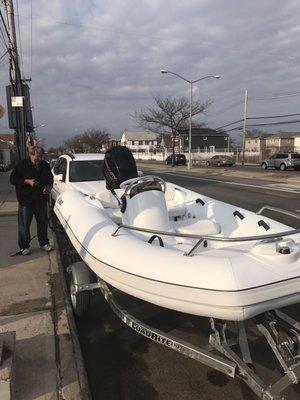 Mr Buster's prepping the dinghy!