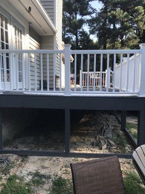 Composite decking with vinyl railing