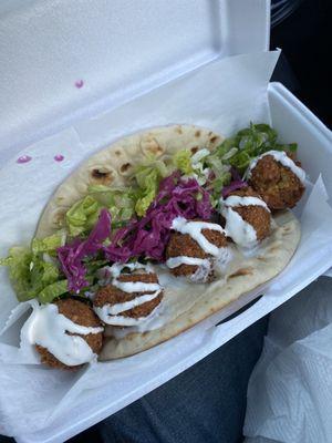 Falafel loaded pita, (no tomatoes because I hate tomatoes)