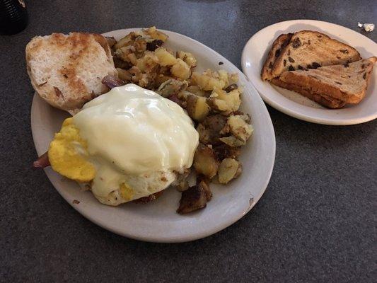 Breakfast Burger with home fries and raisin toast