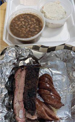 Pork Ribs and sausage. Beans and Potato Salad.  Best potato salad from any BBQ joint.