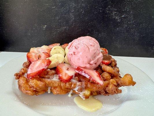 Funnel with strawberry, banana, Nutella, and strawberry ice cream