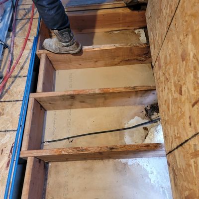 Waterproofing and insulating the patio floor.