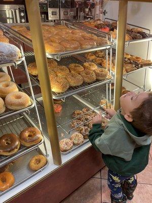 My 3 year old picking his fav. Sprinkle donut