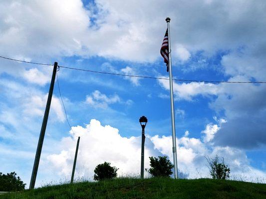 TYRON ELLIOTT TRAINWATCHING DECK flag pole in Manchester, Georgia.