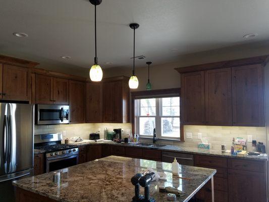 New Kitchen Construction. Pendant Lighting & Under Cabinet Lighting. LED Recessed Cans in the ceiling.