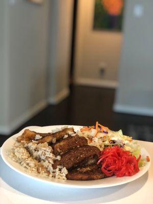 Plated at home the Pork katsu with brown rice & salad added my own store-bought pickled ginger to the meal!