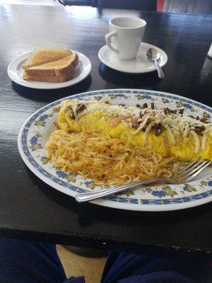 Steak and Cheese Omelet with Hash Brown potatoes and toast