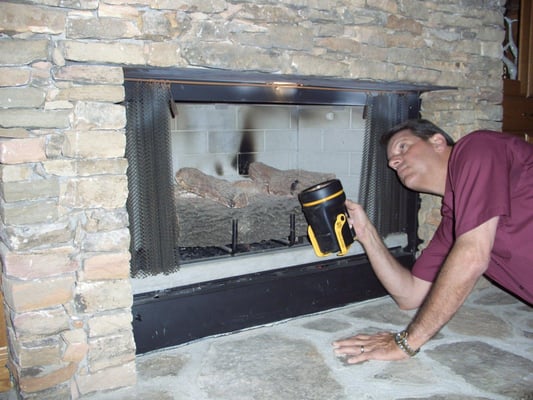 INSPECTING THE FIREPLACE